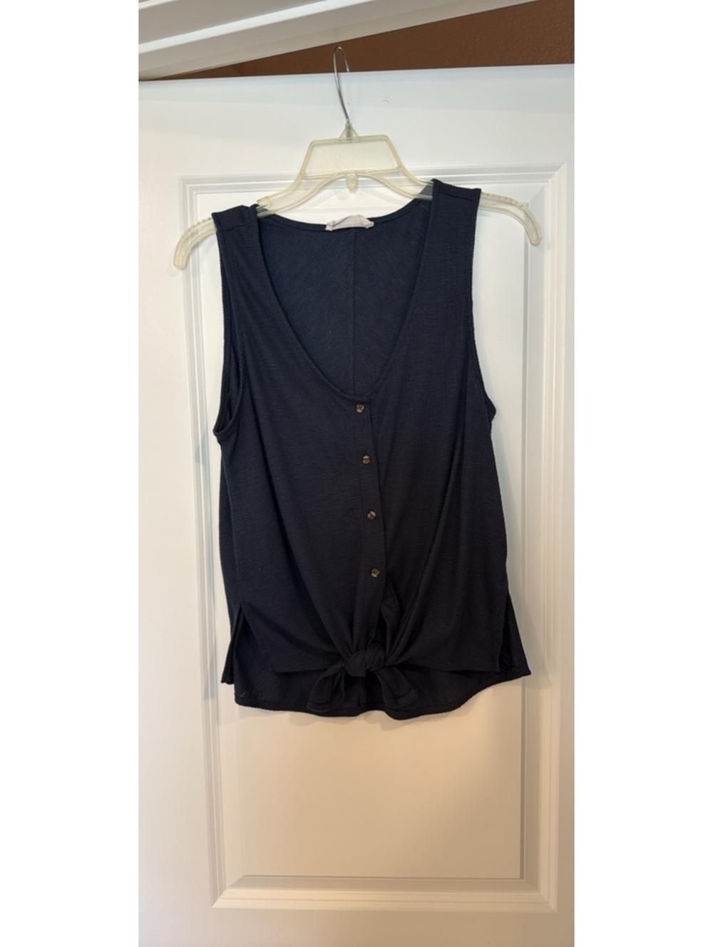 Navy tank with buttons and tie at waist